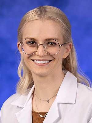 Heather K. Schopper, MD, in a professional head and shoulders photograph.