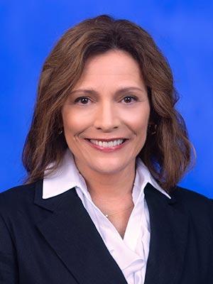 Ruth Gundermann in a professional head and shoulders photograph.