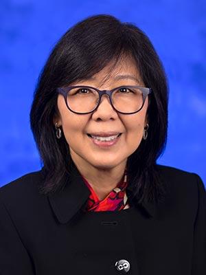 Karen Kim in a professional head and shoulders photograph.