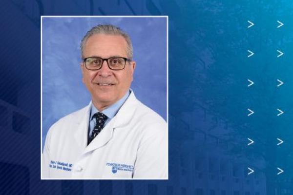 A head-and-shoulders portrait of Wayne J. Sebastianelli, MD, is st against a plain background