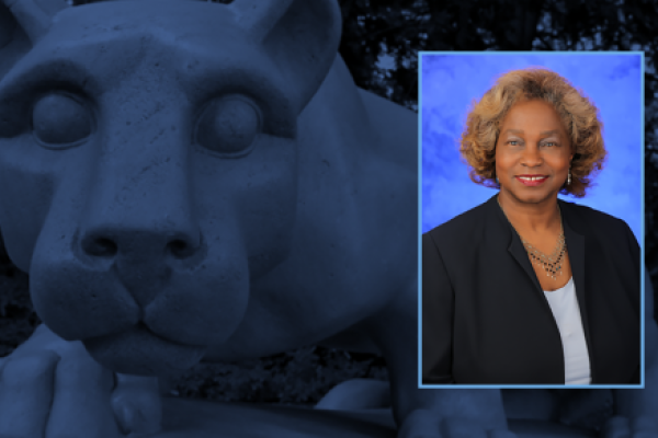 Portrait of Lynette Chappell Williams on a background of a Nittany Lion statue.